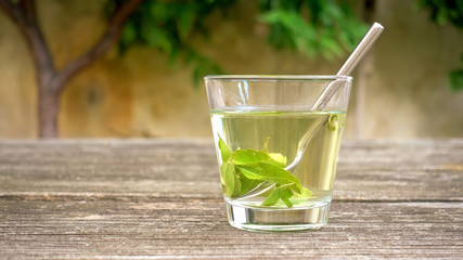 verbena tea on old wooden planks
