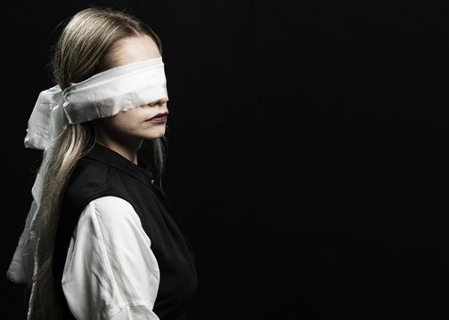 Woman with blindfold and copy space