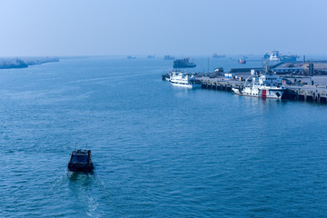 Luannan, April 29, 2018: ships on the coast pier, Tangshan, Hebei, China