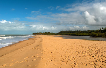 Beach between river and sea
