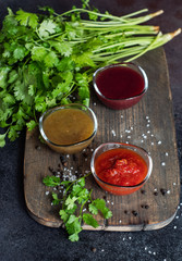 Georgian sauces on stone background