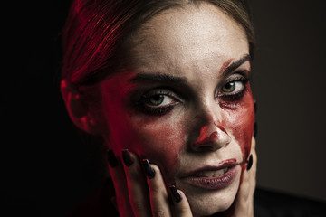 Portrait of woman wearing fake blood makeup