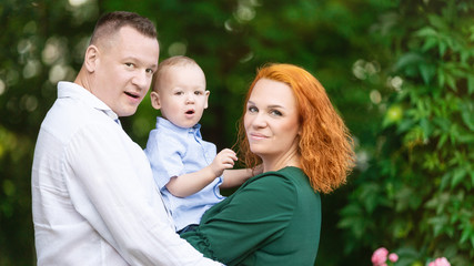 Happy family with son in the park