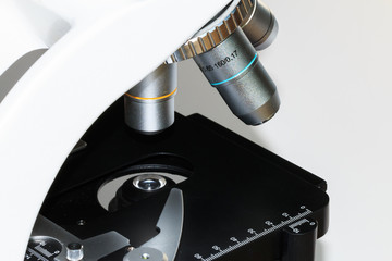 Close up look at a microscope and the lenses.
