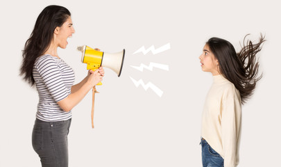 Furious mother shouting at girl through loudspeaker