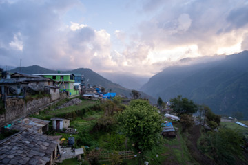 Houses in mountain village and field, Annaourna region, Nepal. Outdoor, alternative.