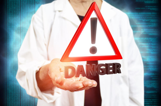 Old white woman scientist holding a red danger triangle warning sign on a blurred blue digital background 3d rendering. Concept for genetic engineering, gene manipulation and new technologies threats