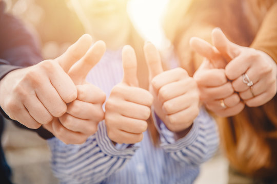 Thumbs up teenagers approve and show gesture like, sunlight