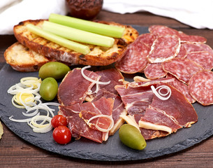 pieces of jamon and white fried bread