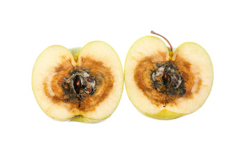 Two halves of a single rotten apple