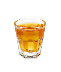 Glass of scotch whiskey and ice on  white background