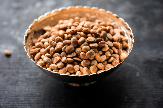 Indian charoly / Buchanania lanzan / Almondette kernel seeds in a bowl or pile. selective focus