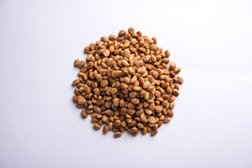 Indian charoly / Buchanania lanzan / Almondette kernel seeds in a bowl or pile. selective focus