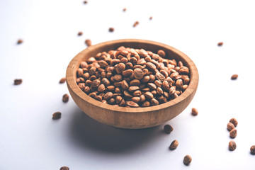 Indian charoly / Buchanania lanzan / Almondette kernel seeds in a bowl or pile. selective focus