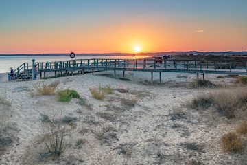 Sunset at the Algarve beach Praia Alvor between Lagos and Portimao