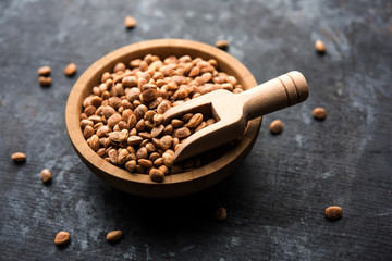 Indian charoly / Buchanania lanzan / Almondette kernel seeds in a bowl or pile. selective focus