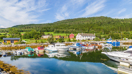Fototapeta na wymiar Pictureseque small fishing village Eidsora along Tingvollfjorden in More og Romsdal county in Norway