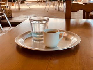 cup of coffee on wooden table