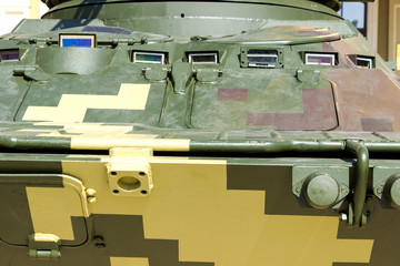 Armored fighting combat vehicle. Close-up combat military equipment.