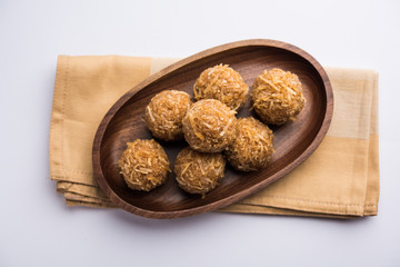 Jaggery coconut Laddoo / Nariyal gur ke laddu, indian sweet food for festivals like rakshabandhan/rakhi pournima