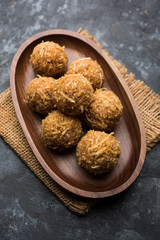 Jaggery coconut Laddoo / Nariyal gur ke laddu, indian sweet food for festivals like...