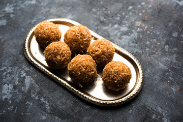 Jaggery coconut Laddoo / Nariyal gur ke laddu, indian sweet food for festivals like rakshabandhan/rakhi pournima