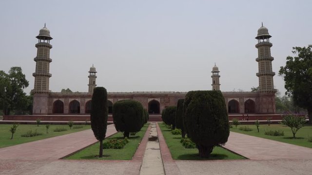 Lahore Shahdara Bagh Jahangir's Tomb Frontal View of the Exterior Mausoleum with Clipped Hedges on a Sunny Blue Sky Day