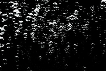 Beautiful abstract texture colorful black and white soap bubbles on the back and darkness background and wallpaper