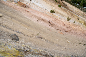Fototapeta na wymiar Rock sediment in Lassen National Park, near the Sulphur Works area. California, USA