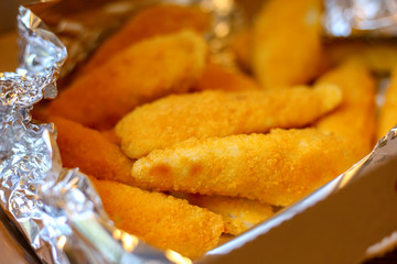 Delivery of delicious golden nuggets. Food delivery. chicken. close up