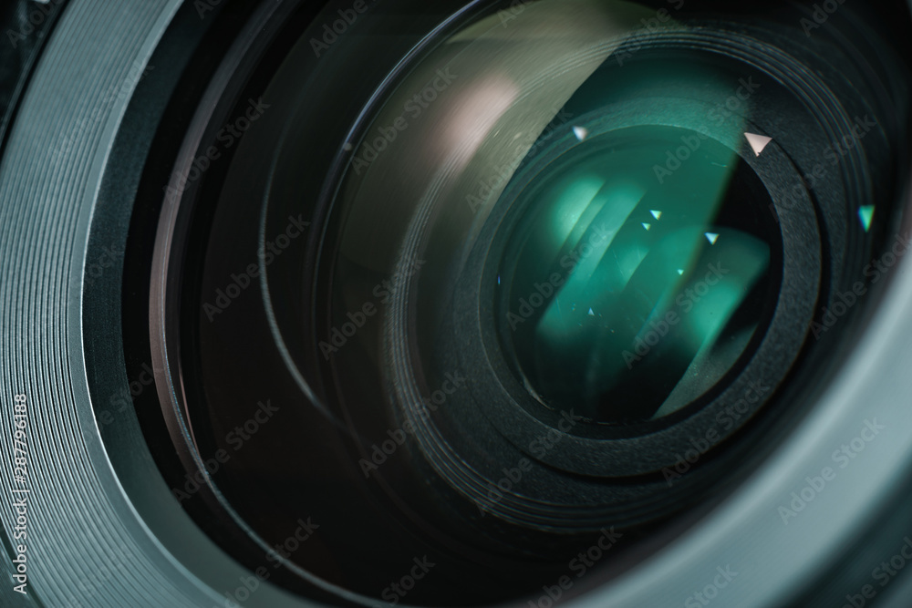 Poster close up beautiful camera lens with color reflection background.