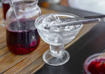 Summer compote of berries with ice. Quench your thirst in summer