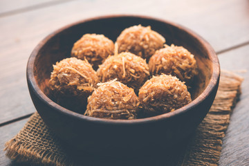 Jaggery coconut Laddoo / Nariyal gur ke laddu, indian sweet food for festivals like rakshabandhan/rakhi pournima