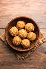 Jaggery coconut Laddoo / Nariyal gur ke laddu, indian sweet food for festivals like rakshabandhan/rakhi pournima