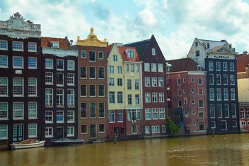 Obraz premium Urban scene with canal houses in Amsterdam, Netherlands, Europe
