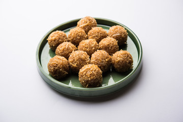 Jaggery coconut Laddoo / Nariyal gur ke laddu, indian sweet food for festivals like rakshabandhan/rakhi pournima