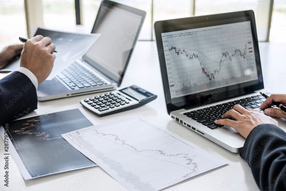 Poster Business team investment working with computer and analysis graph stock market trading with stock chart data, business and technology concept