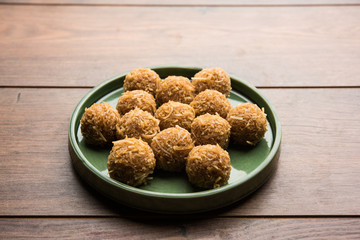 Jaggery coconut Laddoo / Nariyal gur ke laddu, indian sweet food for festivals like rakshabandhan/rakhi pournima