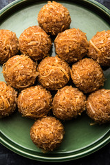 Jaggery coconut Laddoo / Nariyal gur ke laddu, indian sweet food for festivals like rakshabandhan/rakhi pournima