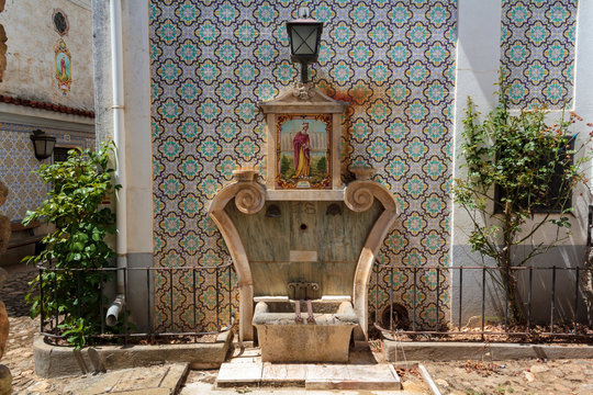 Ancient fountain in Portuguese Village