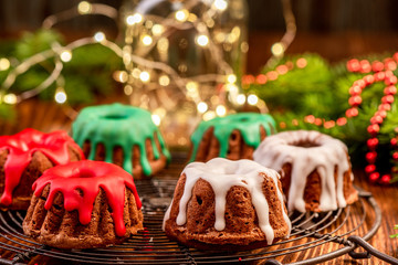 Hemomade Christmas Cake Decorated with Icing on Festive Table