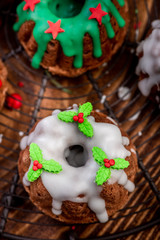 Christmas Cake with Festive Sugar Decorations on  Christmas Table