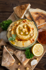 Homemade chickpea hummus with olive oil 