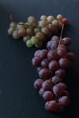 Grape fruits on a black background