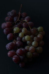 Grape fruits on a black background