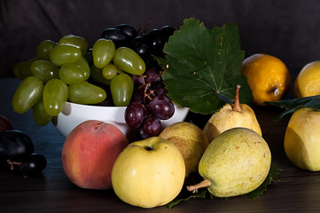 ripe fruits on the wooden table