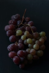 Grape fruits on a black background