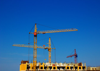 Tower cranes at the construction site