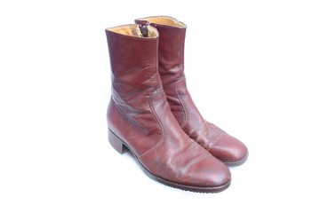 Genuine leather boots on isolated white