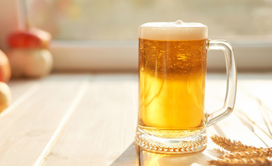 Oktoberfest beer. Glass beer mugs full of golden lager with thick frothy heads conceptual of  Oktoberfest. Beer mug. Big glass of lager beer from Bavaria and Munich Oktoberfest. Festival and Brewery